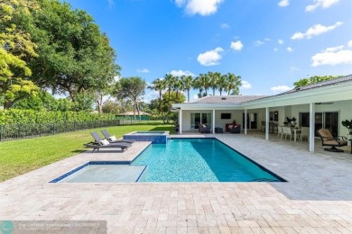 Welcome to 10871 Gleneagles Road, an inviting 4-bedroom on Pine Tree Golf Club in Florida - for sale on GolfHomes.com, golf home, golf lot