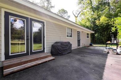 Welcome, golf enthusiasts! Step into this charming four-bedroom on Chiefland Golf and Country Club in Florida - for sale on GolfHomes.com, golf home, golf lot