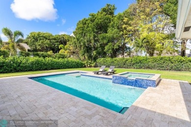 Welcome to 10871 Gleneagles Road, an inviting 4-bedroom on Pine Tree Golf Club in Florida - for sale on GolfHomes.com, golf home, golf lot