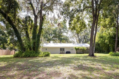 Welcome, golf enthusiasts! Step into this charming four-bedroom on Chiefland Golf and Country Club in Florida - for sale on GolfHomes.com, golf home, golf lot