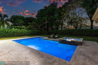 Welcome to 10871 Gleneagles Road, an inviting 4-bedroom on Pine Tree Golf Club in Florida - for sale on GolfHomes.com, golf home, golf lot