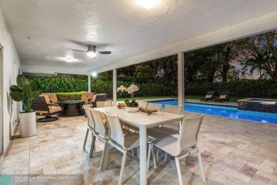 Welcome to 10871 Gleneagles Road, an inviting 4-bedroom on Pine Tree Golf Club in Florida - for sale on GolfHomes.com, golf home, golf lot