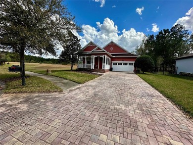 Nestled on a quiet cul-de-sac, In the golf community of Southern on Southern Hills Plantation Club in Florida - for sale on GolfHomes.com, golf home, golf lot