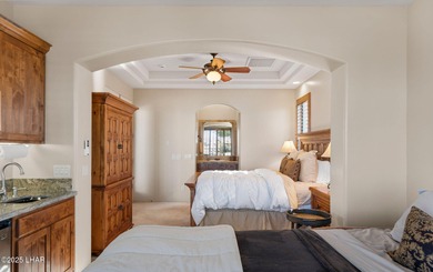 Experience elevated living in this refined Refuge residence on The Refuge Golf and Country Club in Arizona - for sale on GolfHomes.com, golf home, golf lot