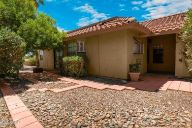 This beautifully remodeled home backs to Ahwatukee Lakes Golf on The Lakes at Ahwatukee in Arizona - for sale on GolfHomes.com, golf home, golf lot