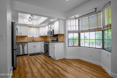 This beautifully remodeled home backs to Ahwatukee Lakes Golf on The Lakes at Ahwatukee in Arizona - for sale on GolfHomes.com, golf home, golf lot