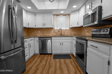 This beautifully remodeled home backs to Ahwatukee Lakes Golf on The Lakes at Ahwatukee in Arizona - for sale on GolfHomes.com, golf home, golf lot