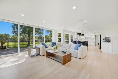 EXPERIENCE RESORT-STYLE LIVING IN THIS FULLY REMODELED 1.5 STORY on Leawood South Country Club in Kansas - for sale on GolfHomes.com, golf home, golf lot