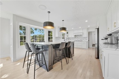 EXPERIENCE RESORT-STYLE LIVING IN THIS FULLY REMODELED 1.5 STORY on Leawood South Country Club in Kansas - for sale on GolfHomes.com, golf home, golf lot