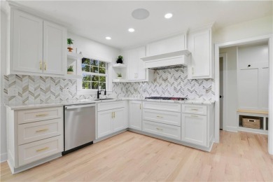 EXPERIENCE RESORT-STYLE LIVING IN THIS FULLY REMODELED 1.5 STORY on Leawood South Country Club in Kansas - for sale on GolfHomes.com, golf home, golf lot