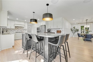 EXPERIENCE RESORT-STYLE LIVING IN THIS FULLY REMODELED 1.5 STORY on Leawood South Country Club in Kansas - for sale on GolfHomes.com, golf home, golf lot