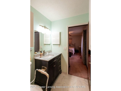 Haslett: Rare offering for this Immaculate 1,700+- sq. ft on Meridian Sun Golf Club in Michigan - for sale on GolfHomes.com, golf home, golf lot