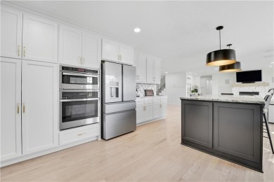 EXPERIENCE RESORT-STYLE LIVING IN THIS FULLY REMODELED 1.5 STORY on Leawood South Country Club in Kansas - for sale on GolfHomes.com, golf home, golf lot