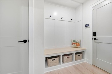 EXPERIENCE RESORT-STYLE LIVING IN THIS FULLY REMODELED 1.5 STORY on Leawood South Country Club in Kansas - for sale on GolfHomes.com, golf home, golf lot