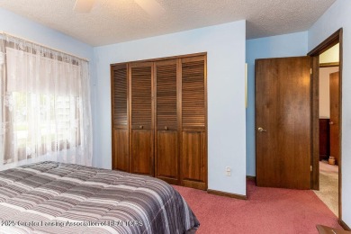 Haslett: Rare offering for this Immaculate 1,700+- sq. ft on Meridian Sun Golf Club in Michigan - for sale on GolfHomes.com, golf home, golf lot