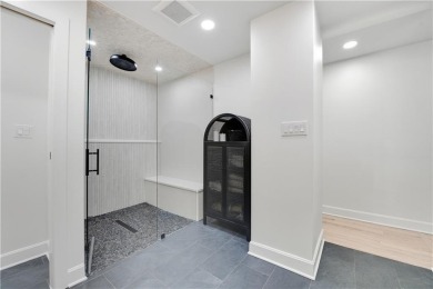 EXPERIENCE RESORT-STYLE LIVING IN THIS FULLY REMODELED 1.5 STORY on Leawood South Country Club in Kansas - for sale on GolfHomes.com, golf home, golf lot