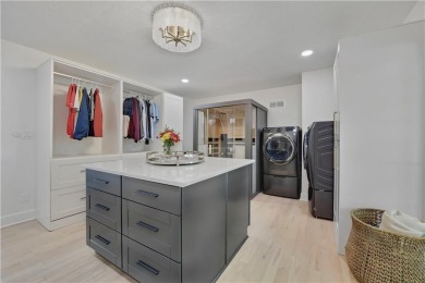 EXPERIENCE RESORT-STYLE LIVING IN THIS FULLY REMODELED 1.5 STORY on Leawood South Country Club in Kansas - for sale on GolfHomes.com, golf home, golf lot