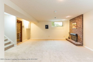 Haslett: Rare offering for this Immaculate 1,700+- sq. ft on Meridian Sun Golf Club in Michigan - for sale on GolfHomes.com, golf home, golf lot