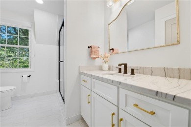 EXPERIENCE RESORT-STYLE LIVING IN THIS FULLY REMODELED 1.5 STORY on Leawood South Country Club in Kansas - for sale on GolfHomes.com, golf home, golf lot