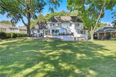 EXPERIENCE RESORT-STYLE LIVING IN THIS FULLY REMODELED 1.5 STORY on Leawood South Country Club in Kansas - for sale on GolfHomes.com, golf home, golf lot