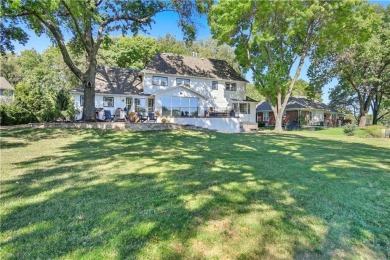 EXPERIENCE RESORT-STYLE LIVING IN THIS FULLY REMODELED 1.5 STORY on Leawood South Country Club in Kansas - for sale on GolfHomes.com, golf home, golf lot