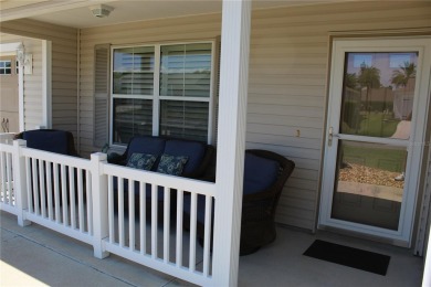 Inviting Sand Dollar model in The Villages' Sanibel neighborhood on Volusia Executive Golf Course  in Florida - for sale on GolfHomes.com, golf home, golf lot