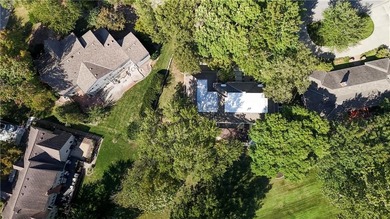 EXPERIENCE RESORT-STYLE LIVING IN THIS FULLY REMODELED 1.5 STORY on Leawood South Country Club in Kansas - for sale on GolfHomes.com, golf home, golf lot