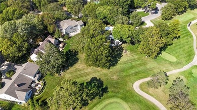 EXPERIENCE RESORT-STYLE LIVING IN THIS FULLY REMODELED 1.5 STORY on Leawood South Country Club in Kansas - for sale on GolfHomes.com, golf home, golf lot