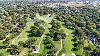 EXPERIENCE RESORT-STYLE LIVING IN THIS FULLY REMODELED 1.5 STORY on Leawood South Country Club in Kansas - for sale on GolfHomes.com, golf home, golf lot
