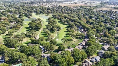 EXPERIENCE RESORT-STYLE LIVING IN THIS FULLY REMODELED 1.5 STORY on Leawood South Country Club in Kansas - for sale on GolfHomes.com, golf home, golf lot