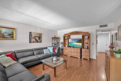 Welcome to your cozy retreat in the heart of a vibrant 55+ on Flamingo Lakes Country Club in Florida - for sale on GolfHomes.com, golf home, golf lot