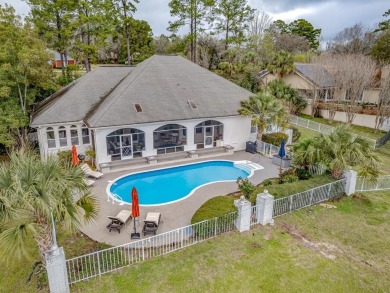 1-story all 4-sides brick pool home with beautiful views of the on The Golf Club At Summerbrooke in Florida - for sale on GolfHomes.com, golf home, golf lot