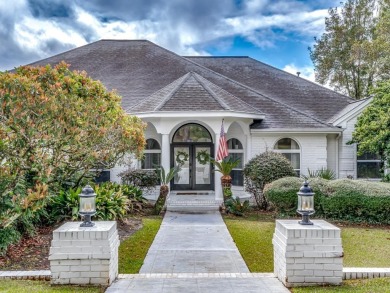 1-story all 4-sides brick pool home with beautiful views of the on The Golf Club At Summerbrooke in Florida - for sale on GolfHomes.com, golf home, golf lot