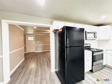 Step into this beautifully painted 2 bedroom, 1 bath rock on Gatesville Country Club in Texas - for sale on GolfHomes.com, golf home, golf lot