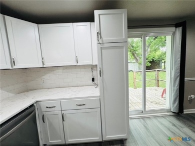 Step into this beautifully painted 2 bedroom, 1 bath rock on Gatesville Country Club in Texas - for sale on GolfHomes.com, golf home, golf lot