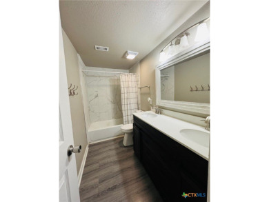 Step into this beautifully painted 2 bedroom, 1 bath rock on Gatesville Country Club in Texas - for sale on GolfHomes.com, golf home, golf lot
