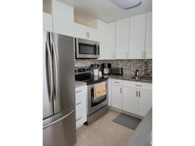 Beautifully Upgraded 2BD/2BA Enclosed Patio First Floor Unit in on Kings Point Golf -Flanders Way in Florida - for sale on GolfHomes.com, golf home, golf lot