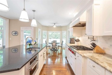 Welcome home to this expertly renovated French Chateau with on Cherokee Town and Country Club in Georgia - for sale on GolfHomes.com, golf home, golf lot