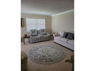 Beautifully Upgraded 2BD/2BA Enclosed Patio First Floor Unit in on Kings Point Golf -Flanders Way in Florida - for sale on GolfHomes.com, golf home, golf lot