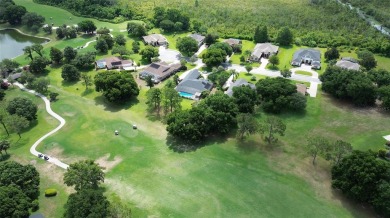 Welcome home to luxury living at its finest - ASSUMABLE VA 2% on Harbor Hills Country Club in Florida - for sale on GolfHomes.com, golf home, golf lot