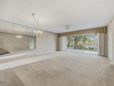 Welcome to a spacious first-floor residence in Waterford at on Bonita Bay West in Florida - for sale on GolfHomes.com, golf home, golf lot