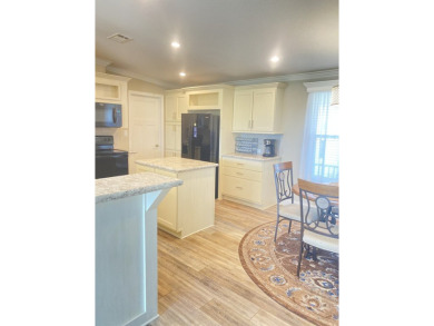 This 2020 Palm Harbor home offers a blend of comfort on Scotland Yards Golf Club in Florida - for sale on GolfHomes.com, golf home, golf lot