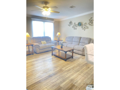 This 2020 Palm Harbor home offers a blend of comfort on Scotland Yards Golf Club in Florida - for sale on GolfHomes.com, golf home, golf lot