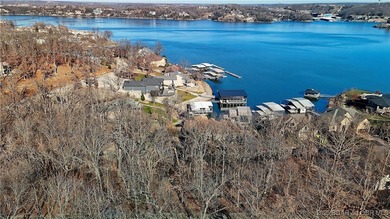 Enjoy breathtaking lake views from this premier building lot in on The Club At Porto Cima in Missouri - for sale on GolfHomes.com, golf home, golf lot