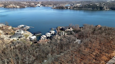 Enjoy breathtaking lake views from this premier building lot in on The Club At Porto Cima in Missouri - for sale on GolfHomes.com, golf home, golf lot