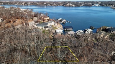 Enjoy breathtaking lake views from this premier building lot in on The Club At Porto Cima in Missouri - for sale on GolfHomes.com, golf home, golf lot