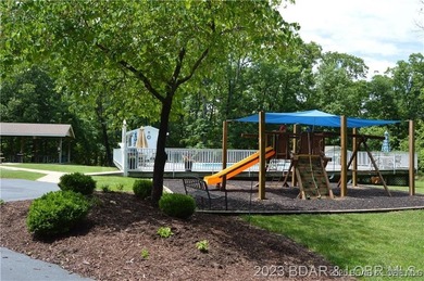 Enjoy breathtaking lake views from this premier building lot in on The Club At Porto Cima in Missouri - for sale on GolfHomes.com, golf home, golf lot