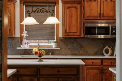 Welcome to your personal retreat in the heart of Falcon Ridge on Falcon Ridge Golf Course in Kansas - for sale on GolfHomes.com, golf home, golf lot