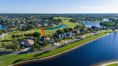 Overlooking the 10th green in the highly desired Viera East Golf on Viera East Golf Club in Florida - for sale on GolfHomes.com, golf home, golf lot