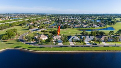 Overlooking the 10th green in the highly desired Viera East Golf on Viera East Golf Club in Florida - for sale on GolfHomes.com, golf home, golf lot